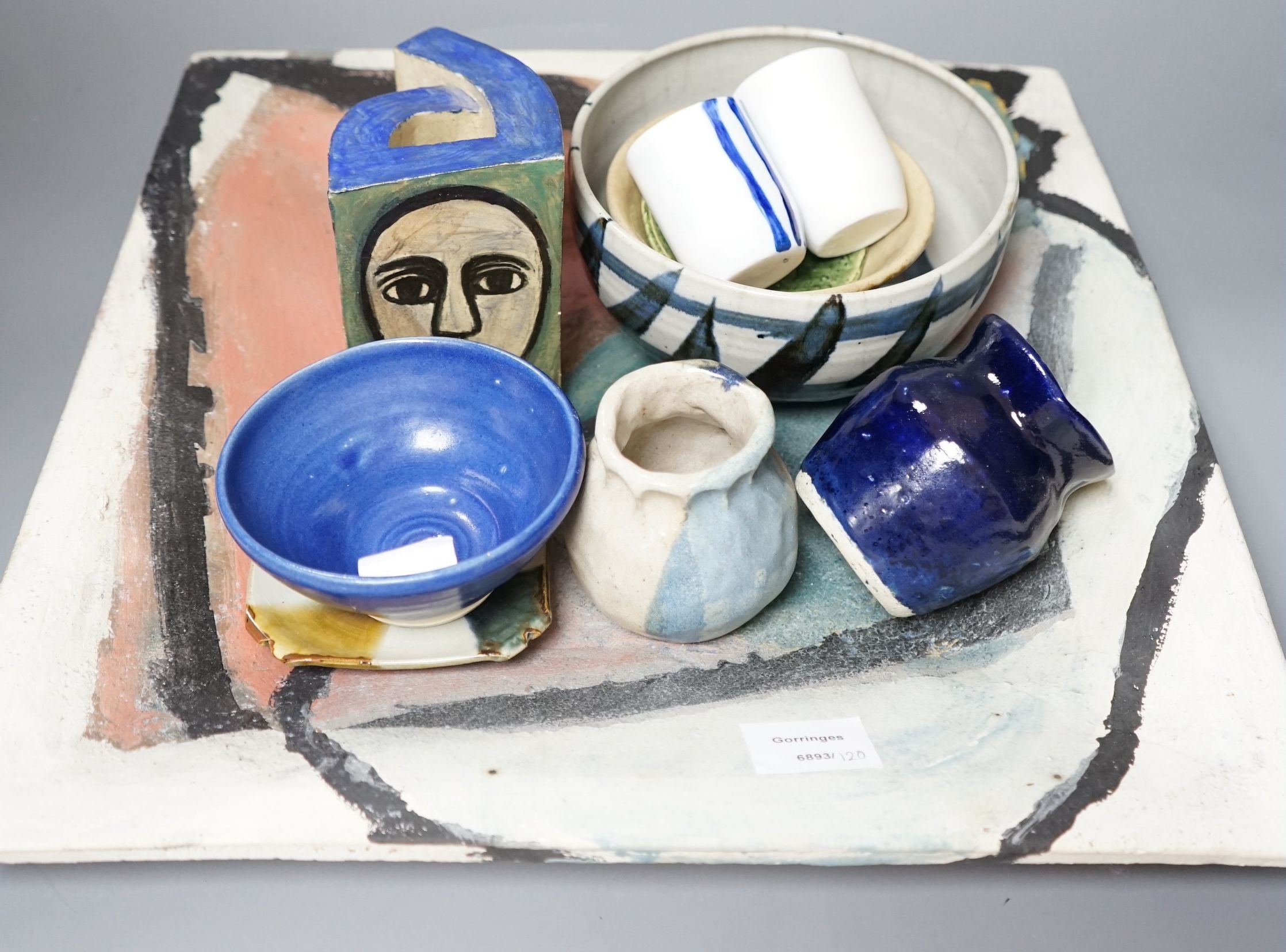 Studio pottery; a large square polychrome platter signed ‘Eastman June 87’ and a geometric vase indistinctly signed and dated 91, together with other various studio pottery wares